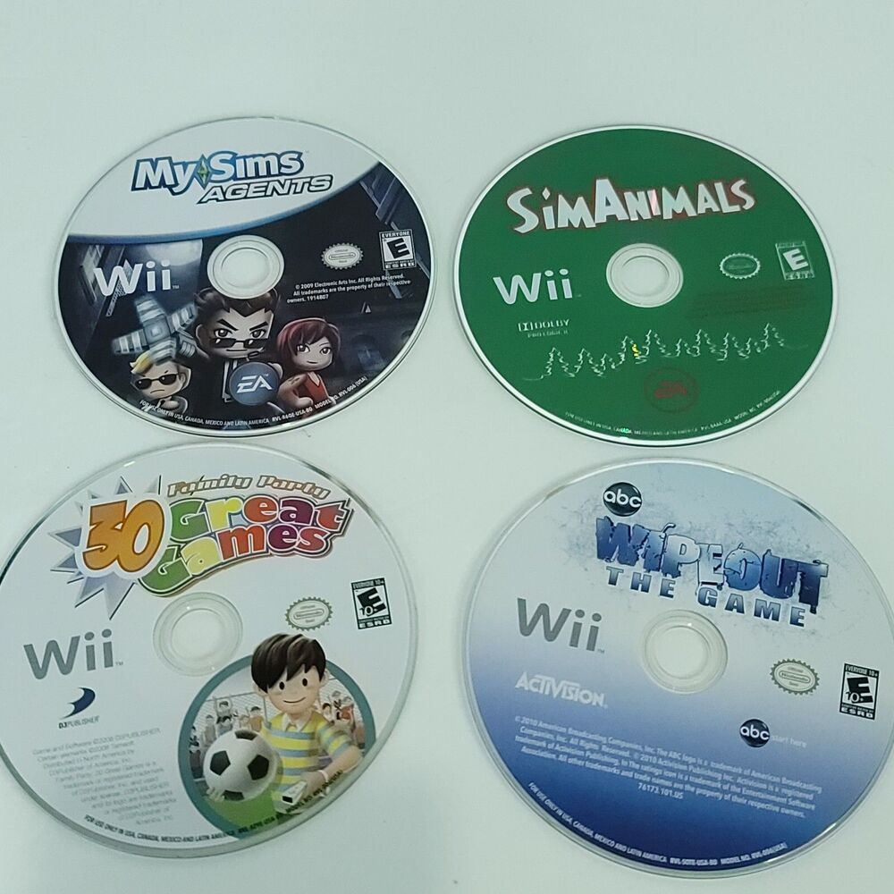 Nintendo Wii Games Lot of 4 Bundle Wipeout 30 Great Games Sim Animals My Sims